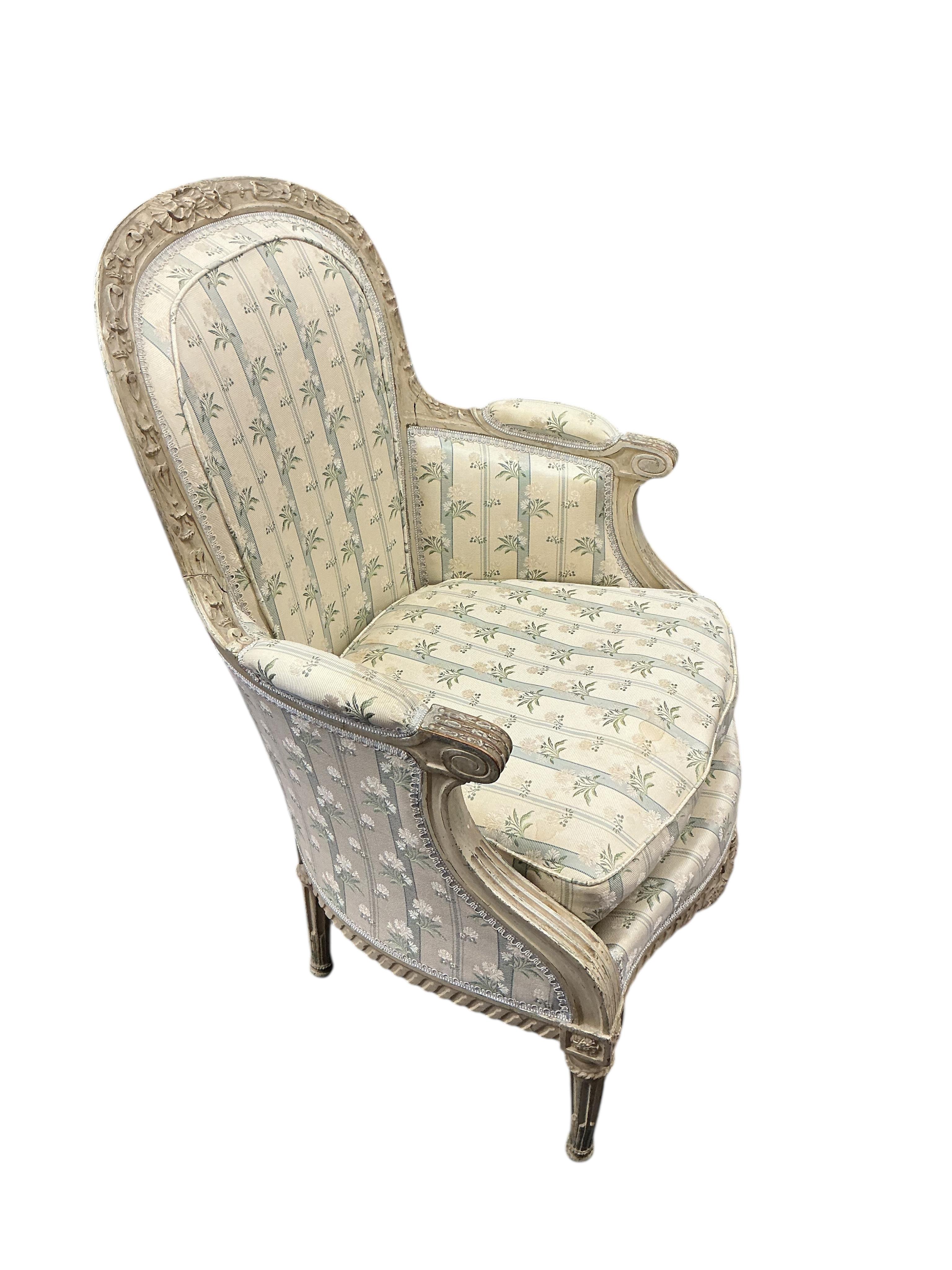 A Louis XVI style upholstered painted armchair, width 68cm, 54cm, height 98cm